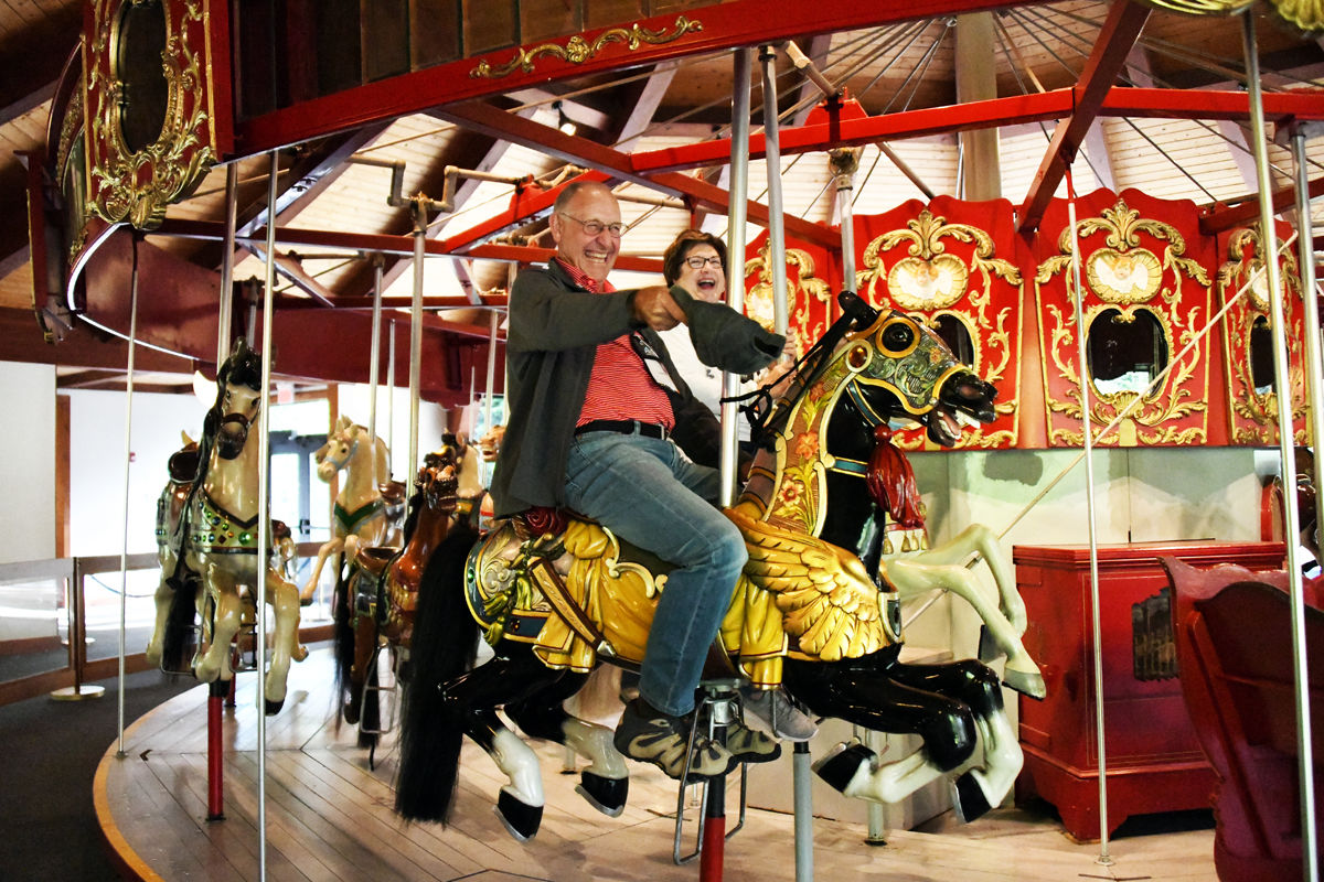 078 James and Susan Watt on the 1908 Looff Carousel.jpg